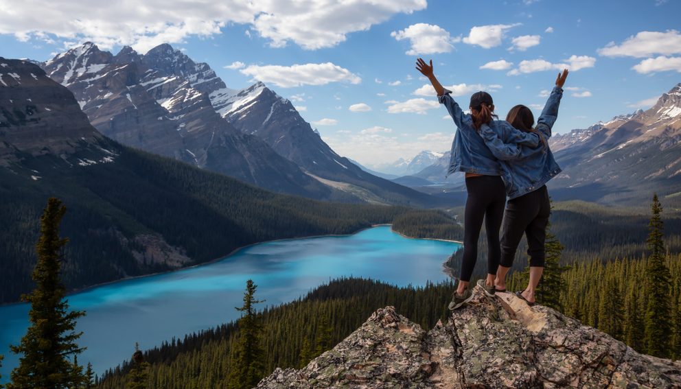 Couple,Female,Friends,Are,Enjoying,The,Beautiful,Canadian,Rockies,Landscape